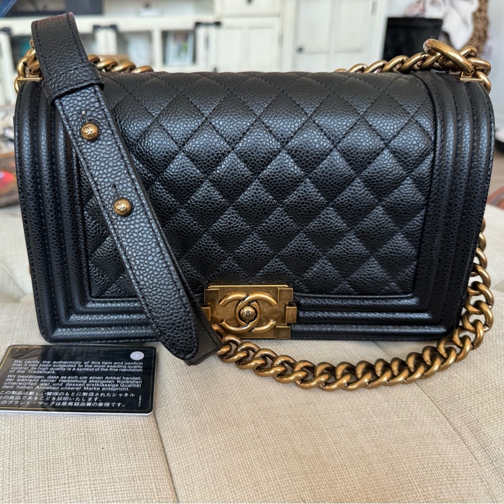 Brand new black and gold purse